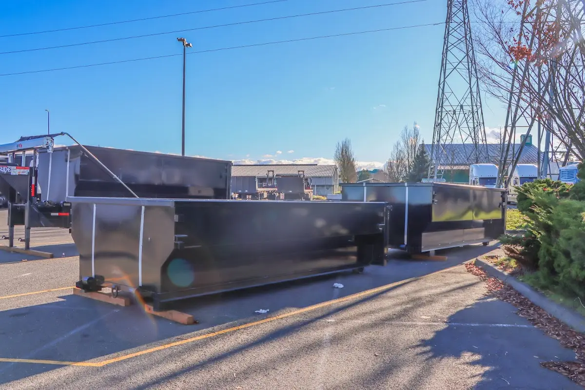 Roll-off dumpster ready for waste disposal at job site for Roofing Dumpster Rental in Highland